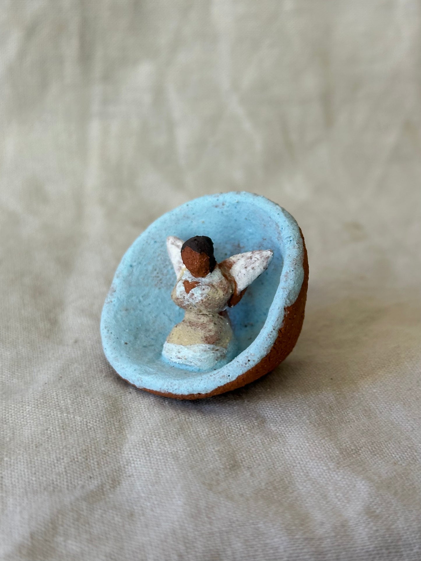 Angel in Shell - miniature clay sculpture