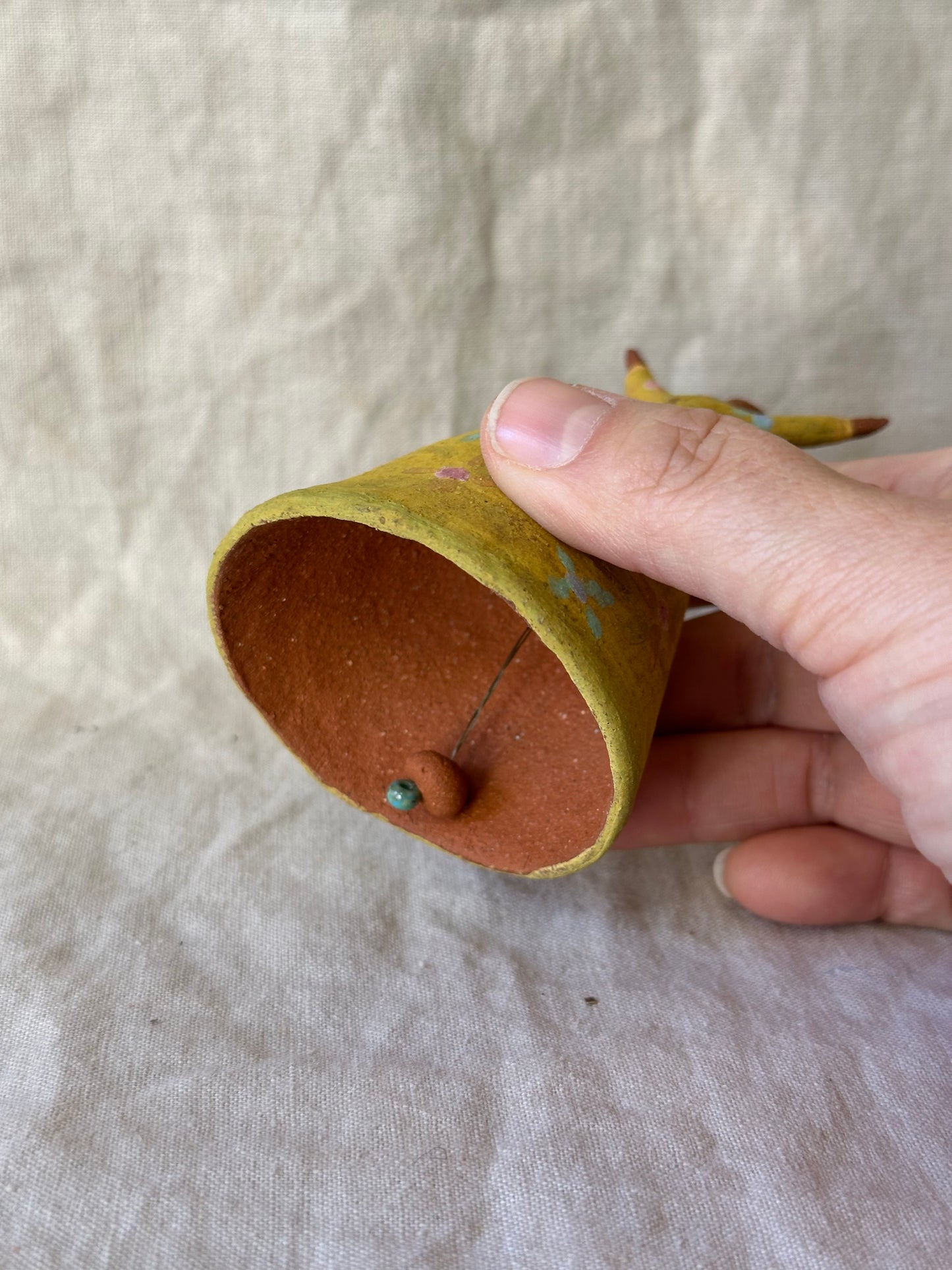 Dancel Bell - Yellow dress open arms