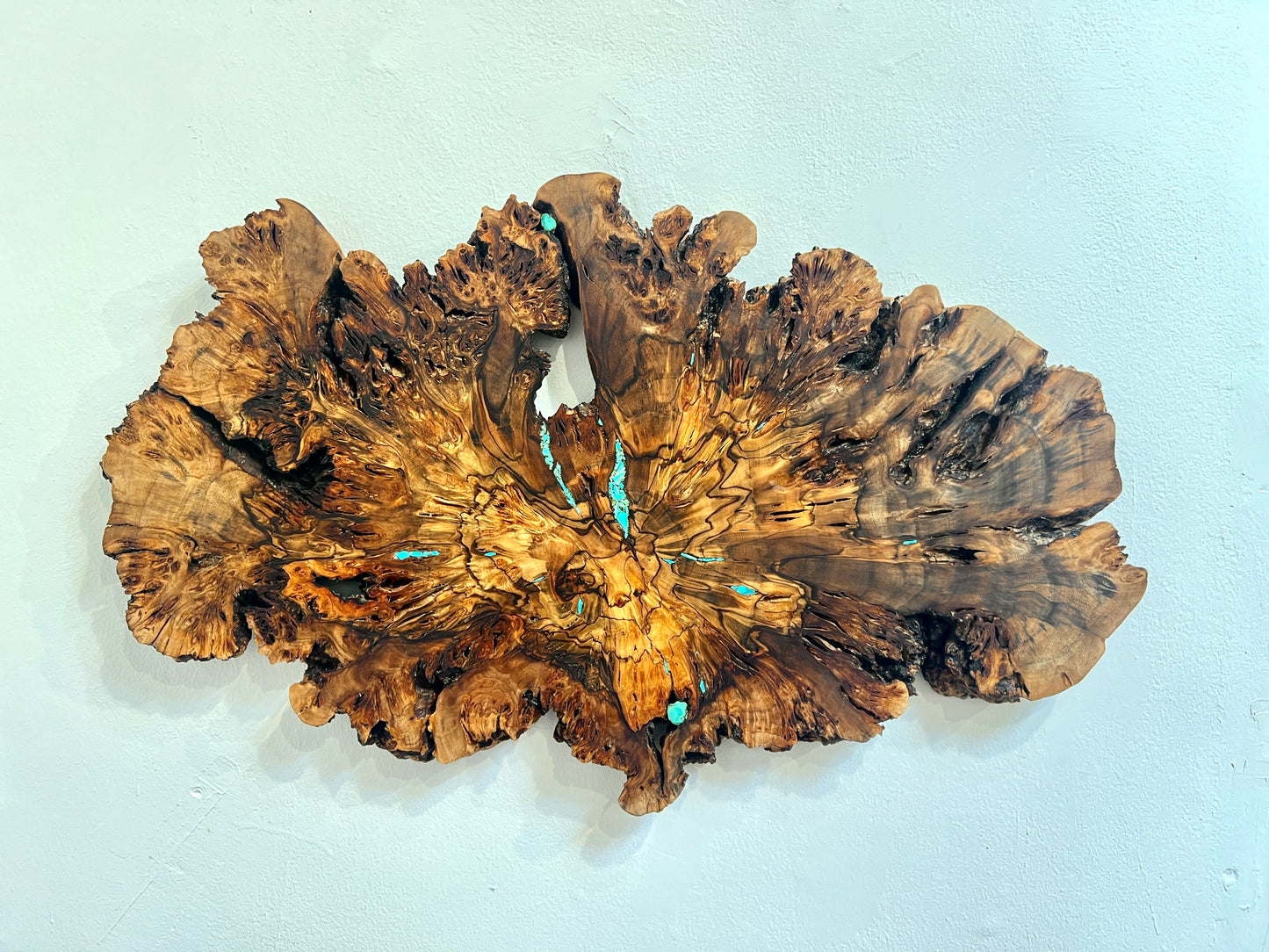 Peppercorn and turquoise wall hanging