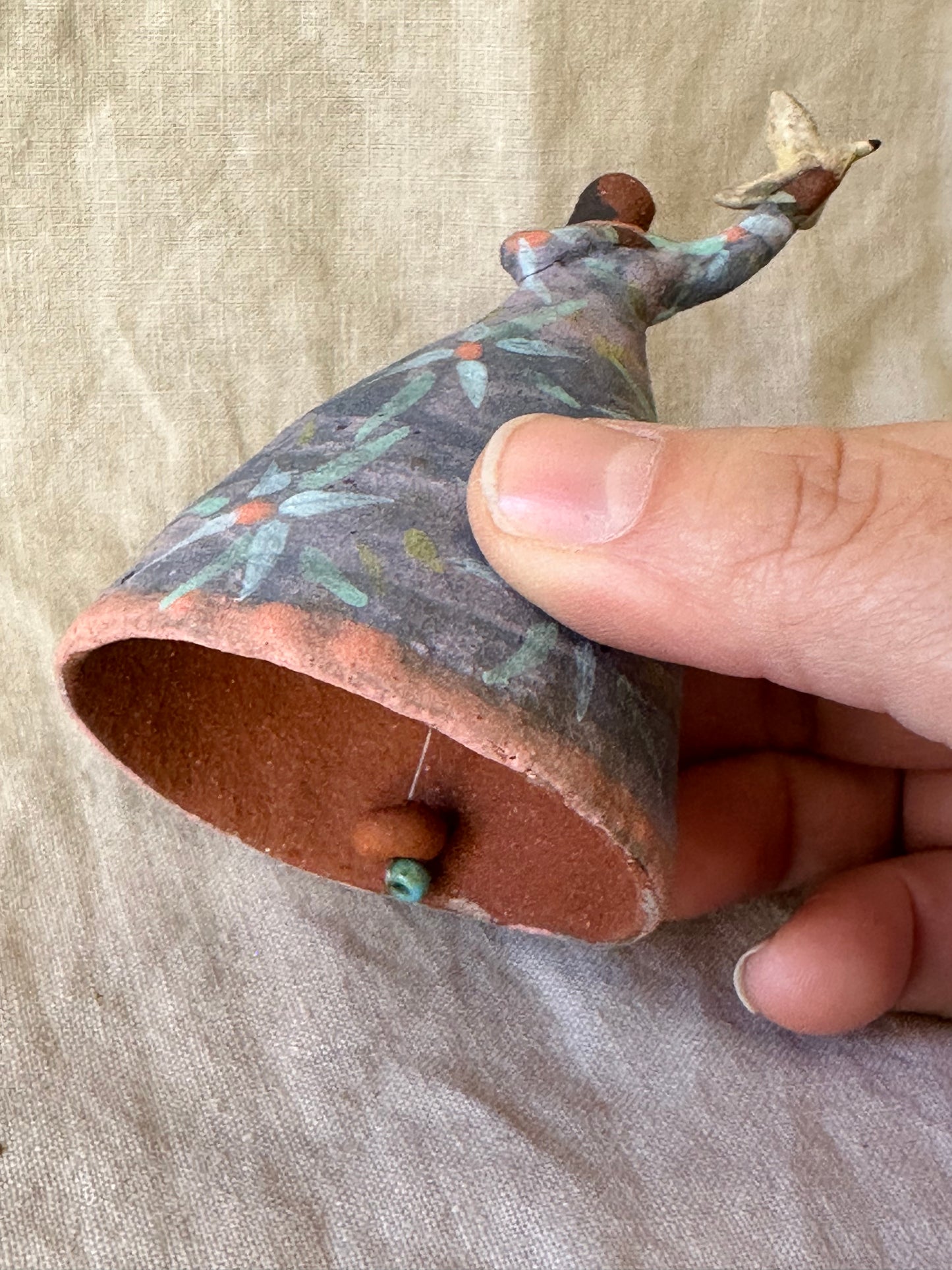 Dancer Bell holding a bird - purple dress flower designs