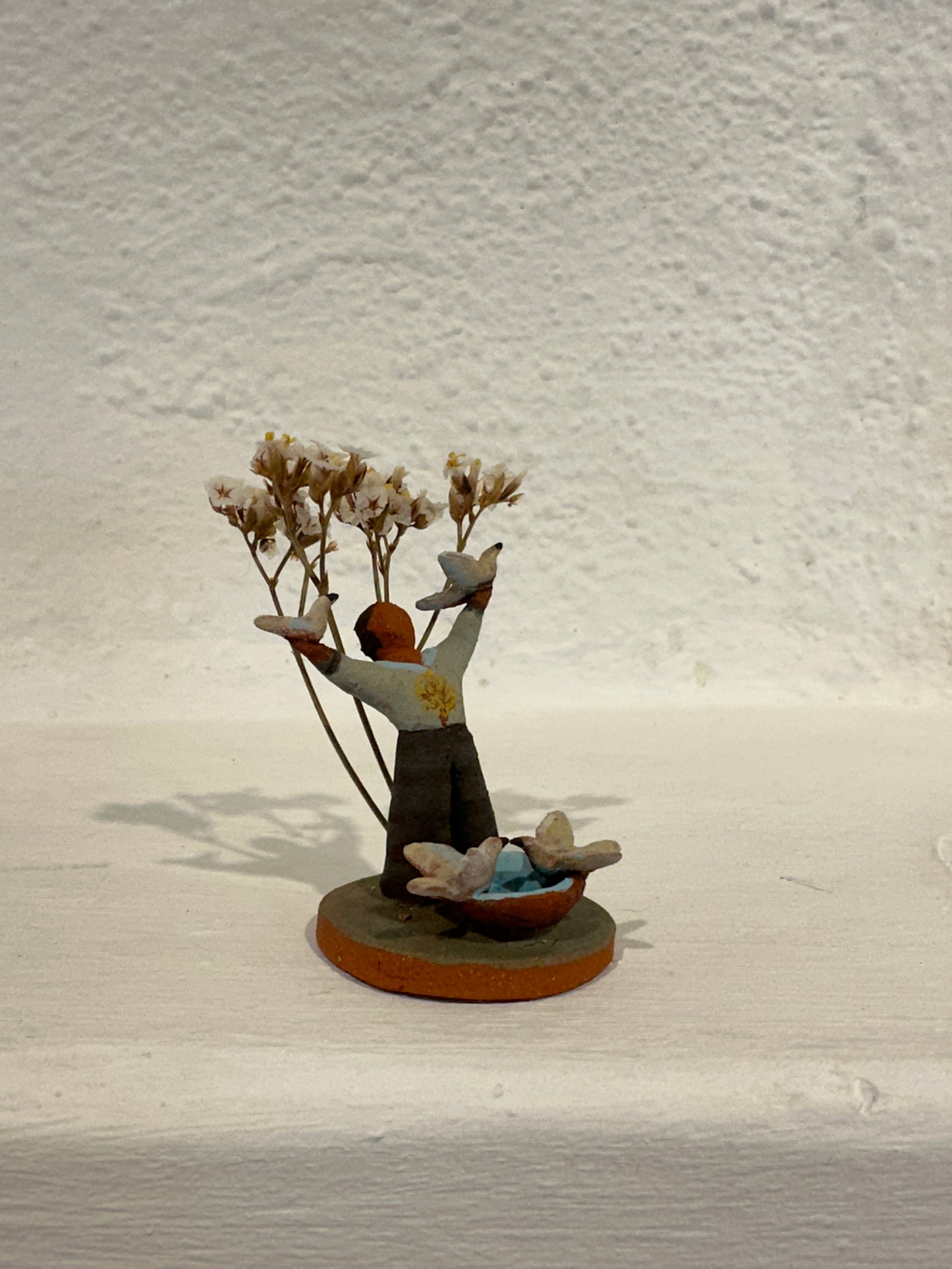 Tiny Sculpture - man with doves
