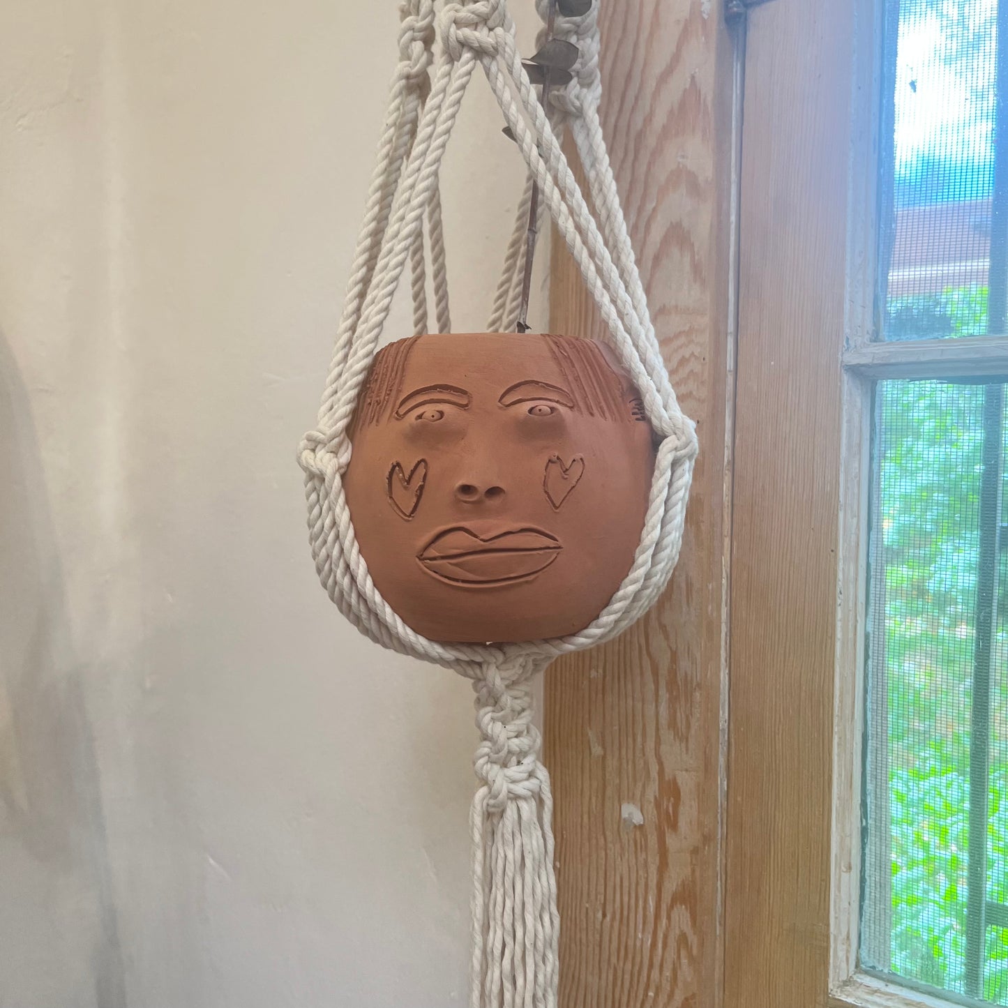 Terracota face planter