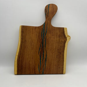 Cutting board with handle