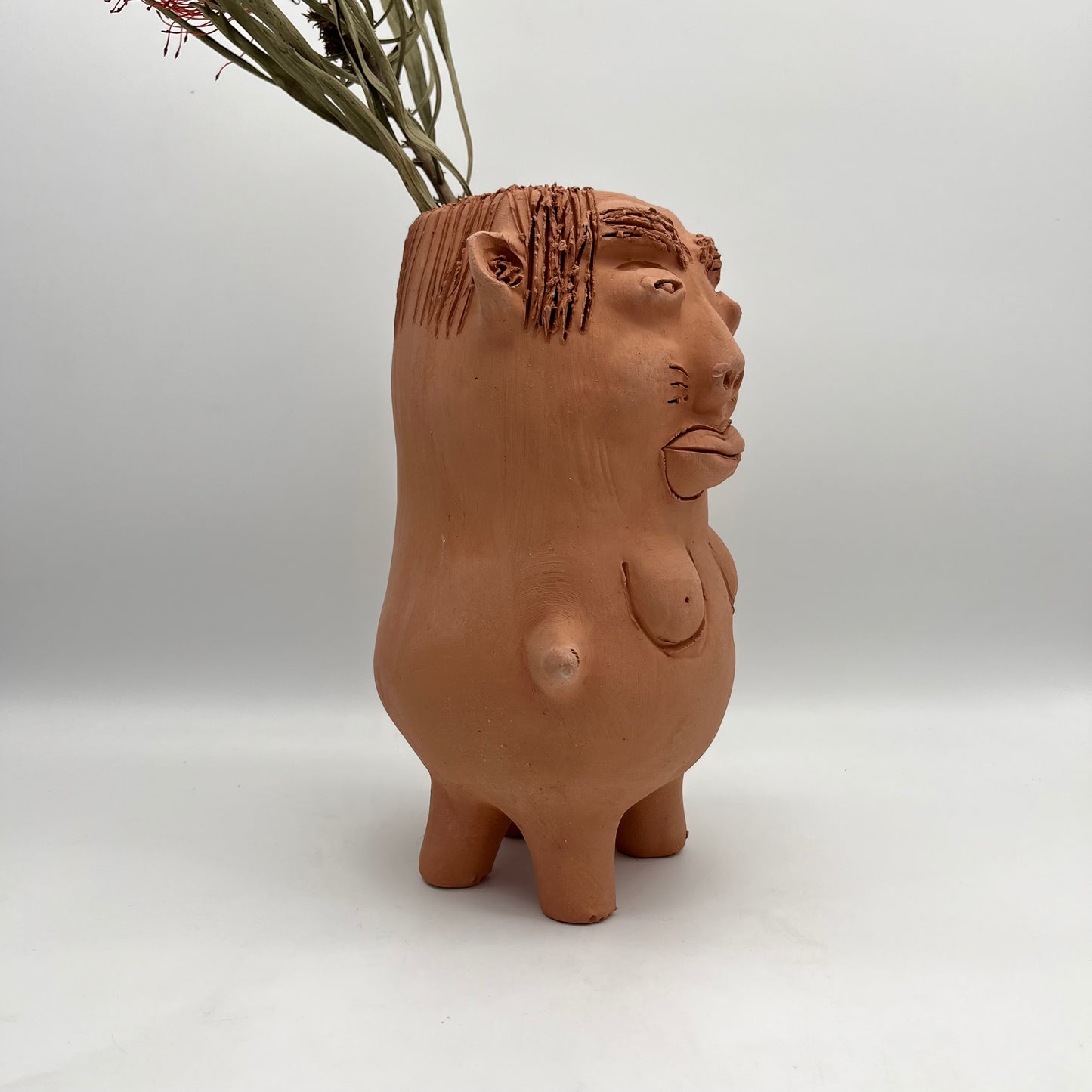 Large ~ Terracota face planter with legs