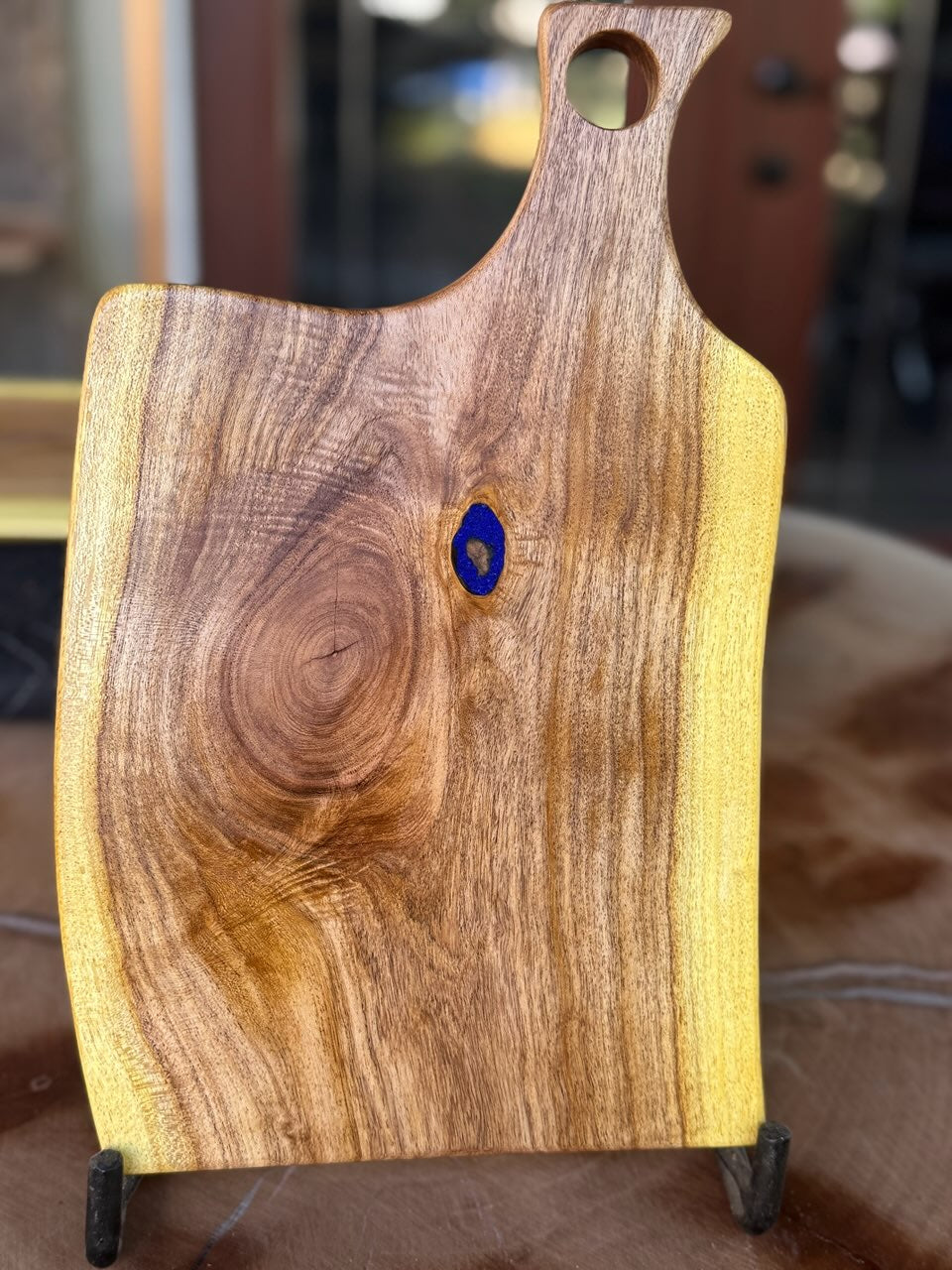 Live edge mesquite cutting board with handle