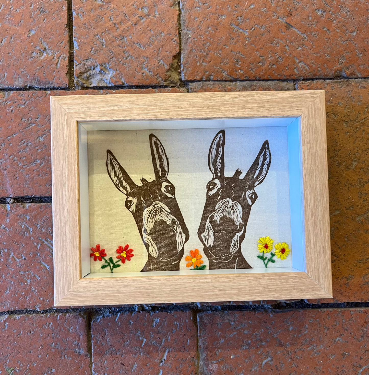 Shadow box ~ Two mules printed on fabric with hand embroidery ~ orange & yellow flowers