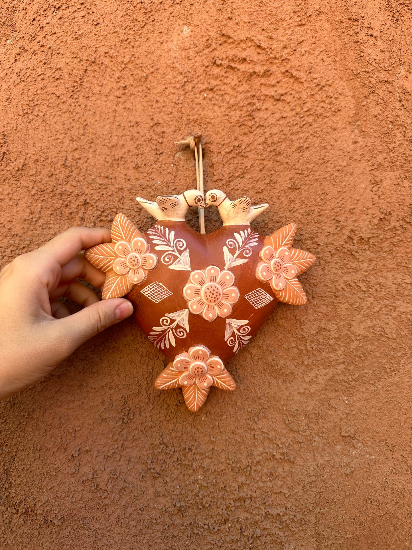 Heart with birds on top