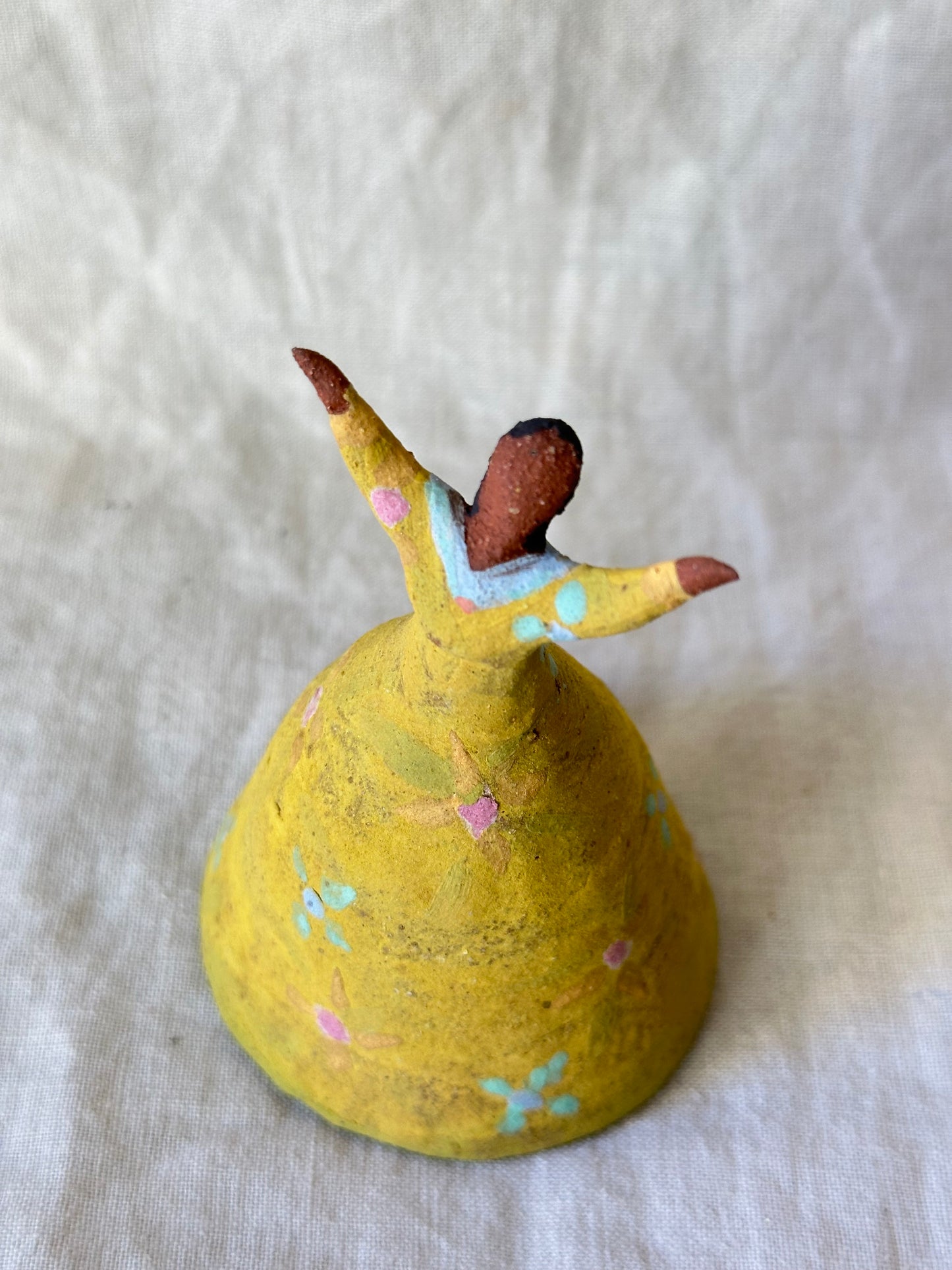 Dancel Bell - Yellow dress open arms