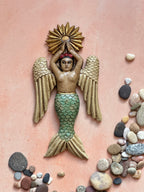 Sirena con alas