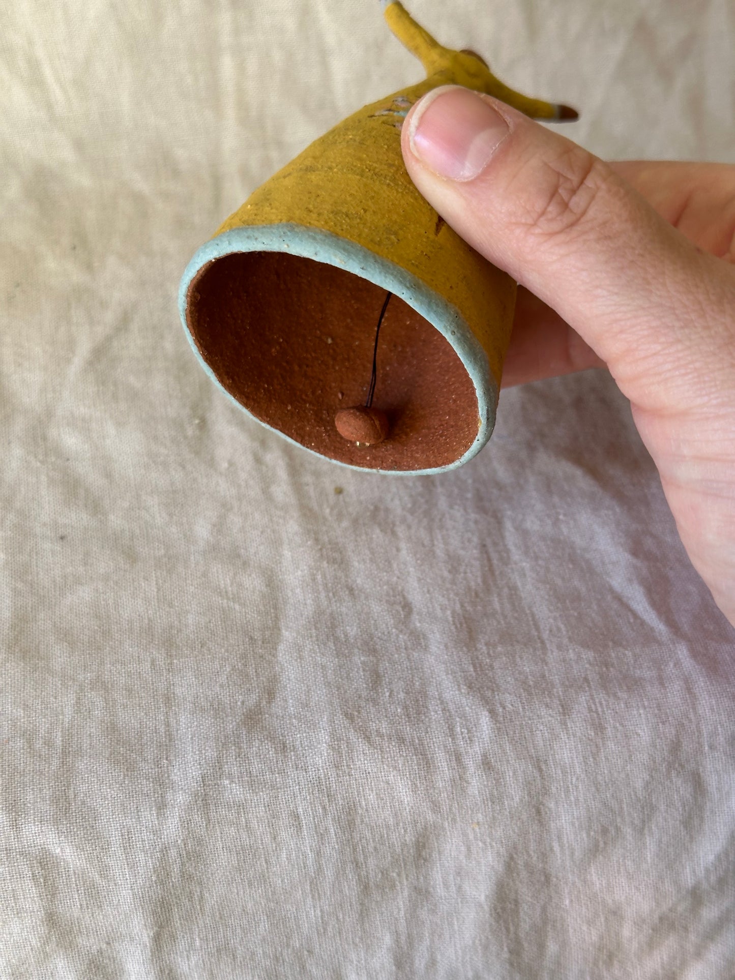 Dancer Bell - Yellow dress with tree design and open arms