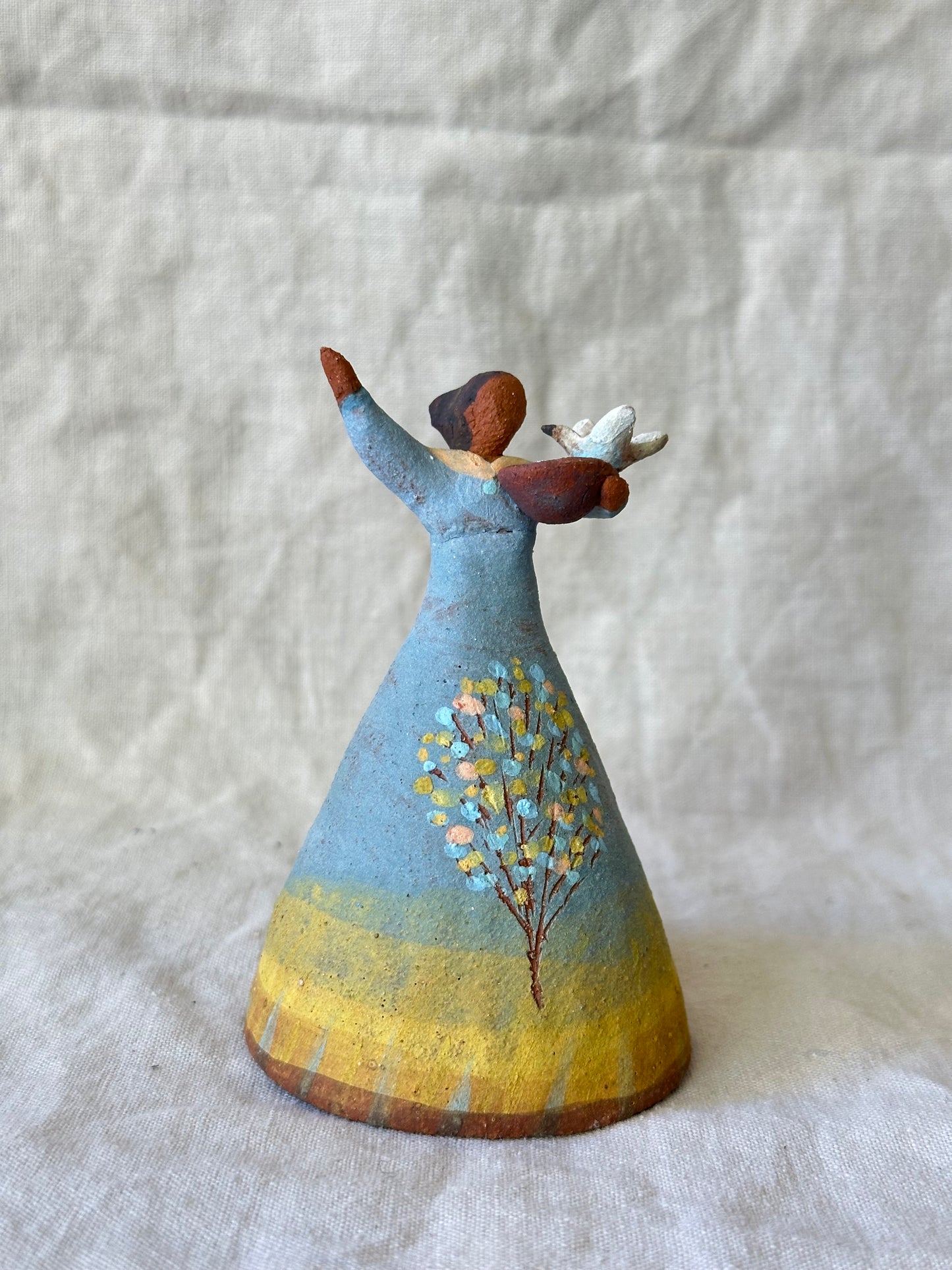 Dancer Bell - Blue and Yellow dress with bird and water bowl