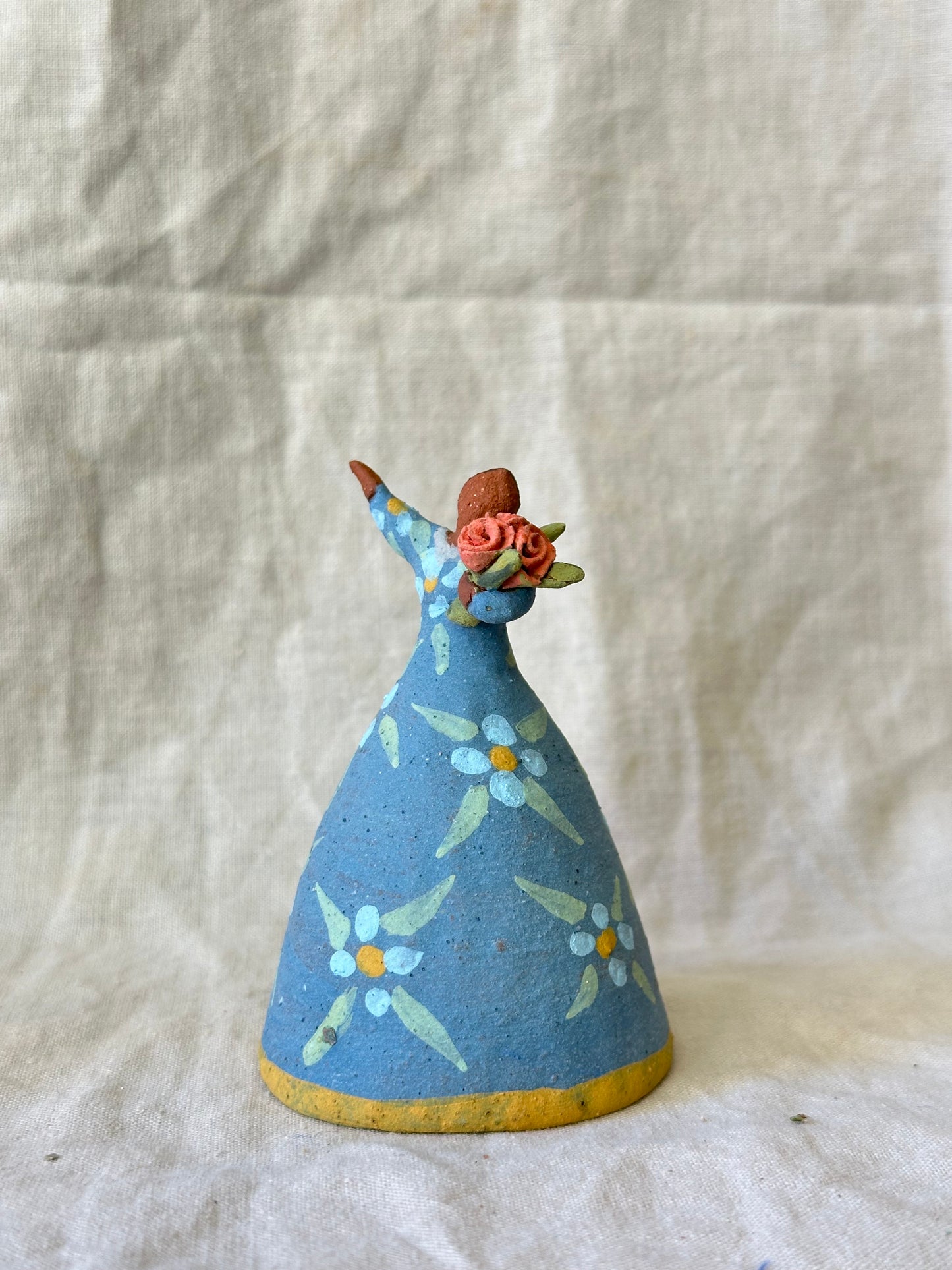 Dancer Bell holding flowers - Blue dress flower designs