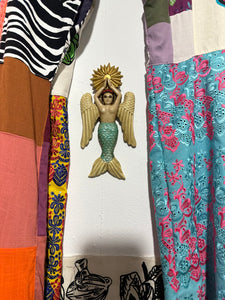 Sirena con alas