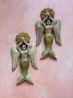 Sirena con alas