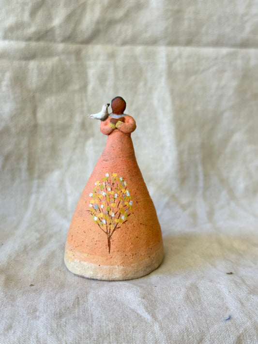 Dancer Bell with bird on shoulder - peach dress