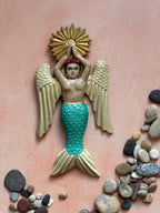 Sirena con alas