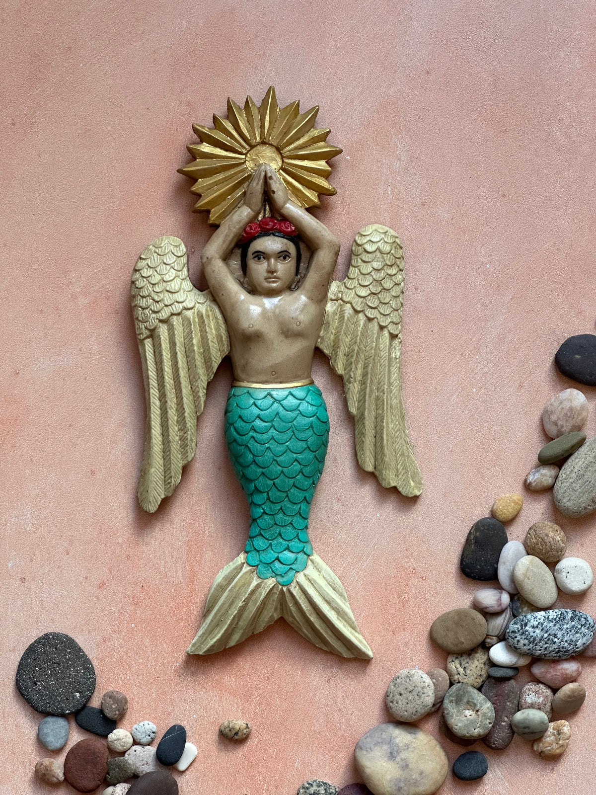 Sirena con alas