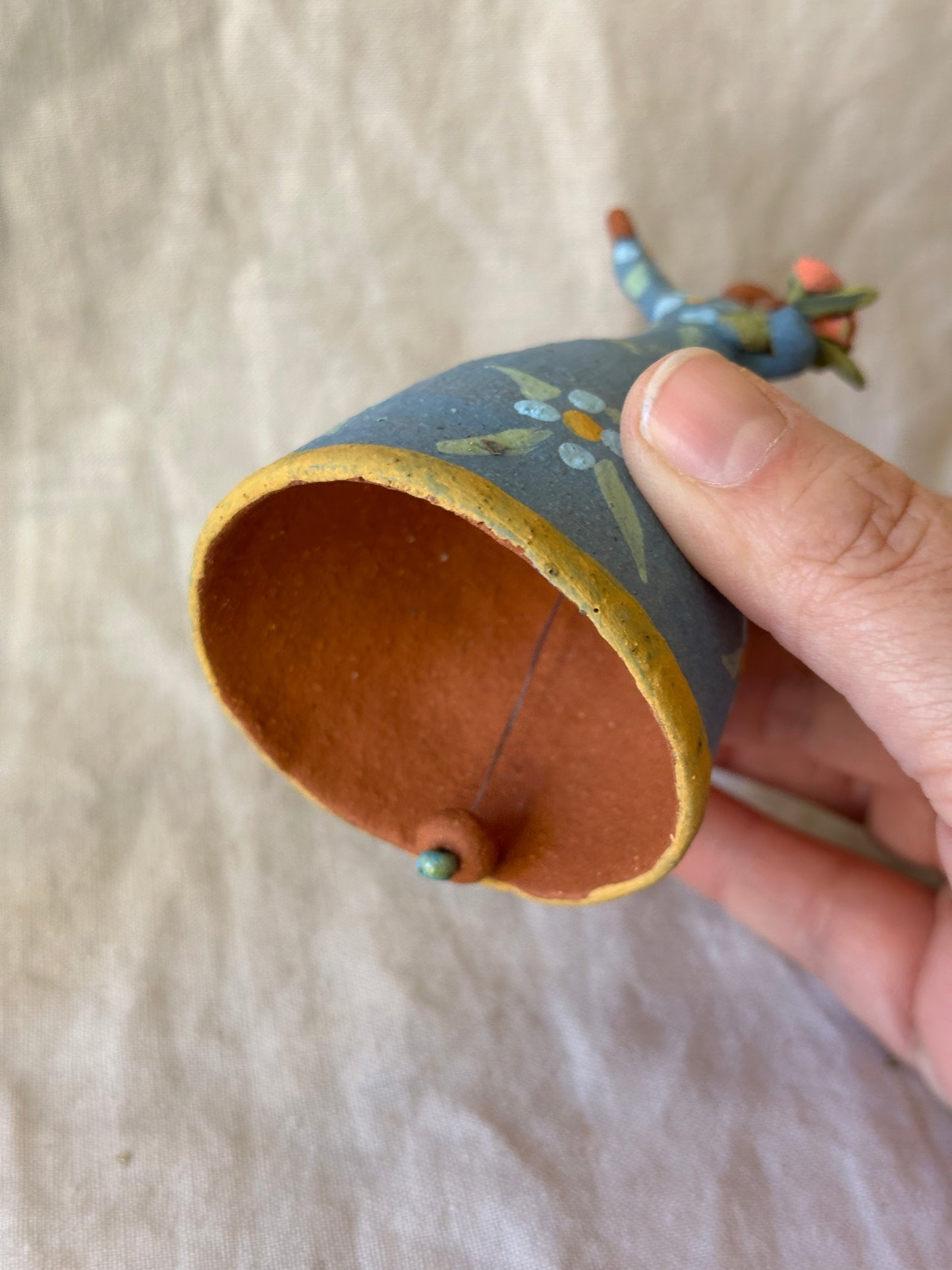 Dancer Bell holding flowers - Blue dress flower designs