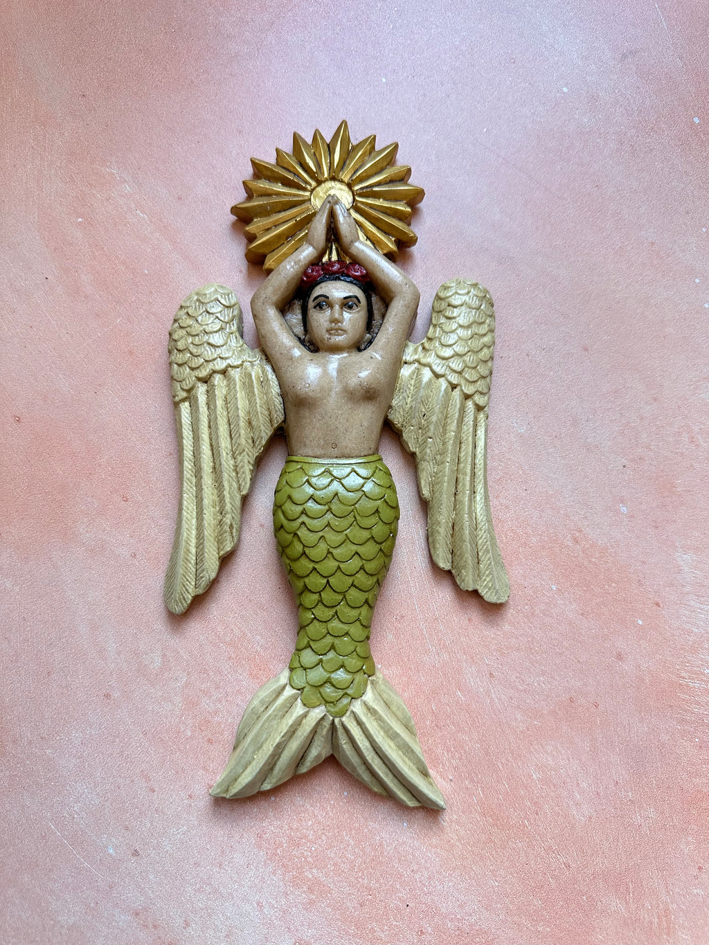 Sirena con alas