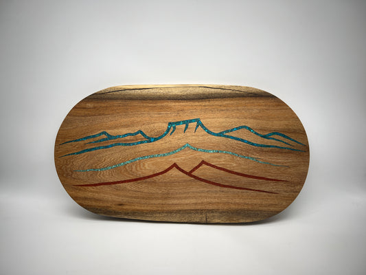 Charcuterie board in mesquite with turquoise & coral inlay