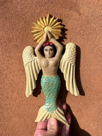 Sirena con alas