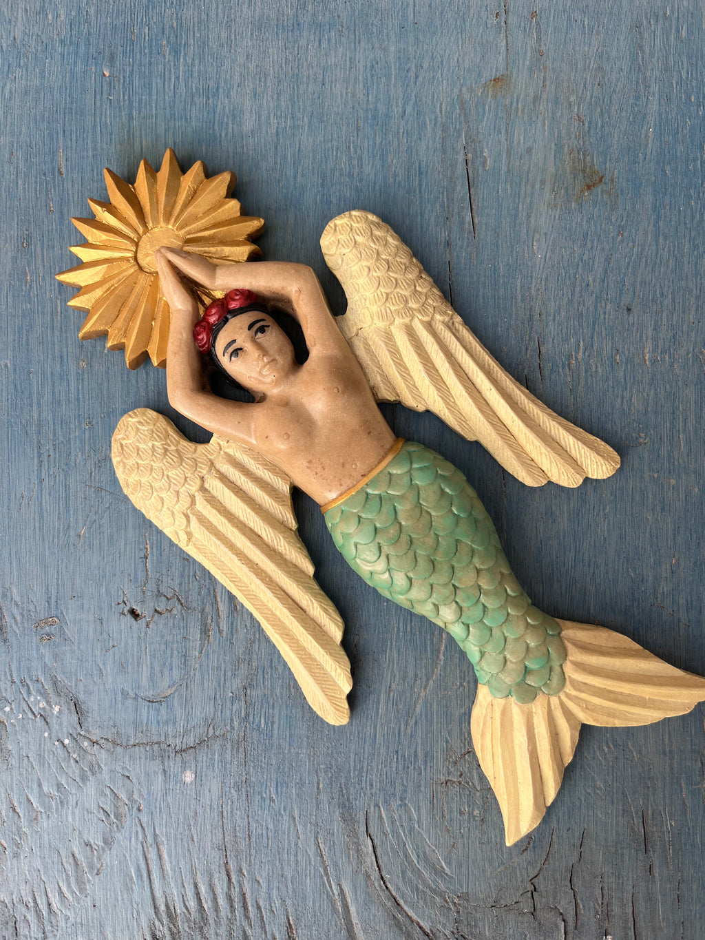 Sirena con alas