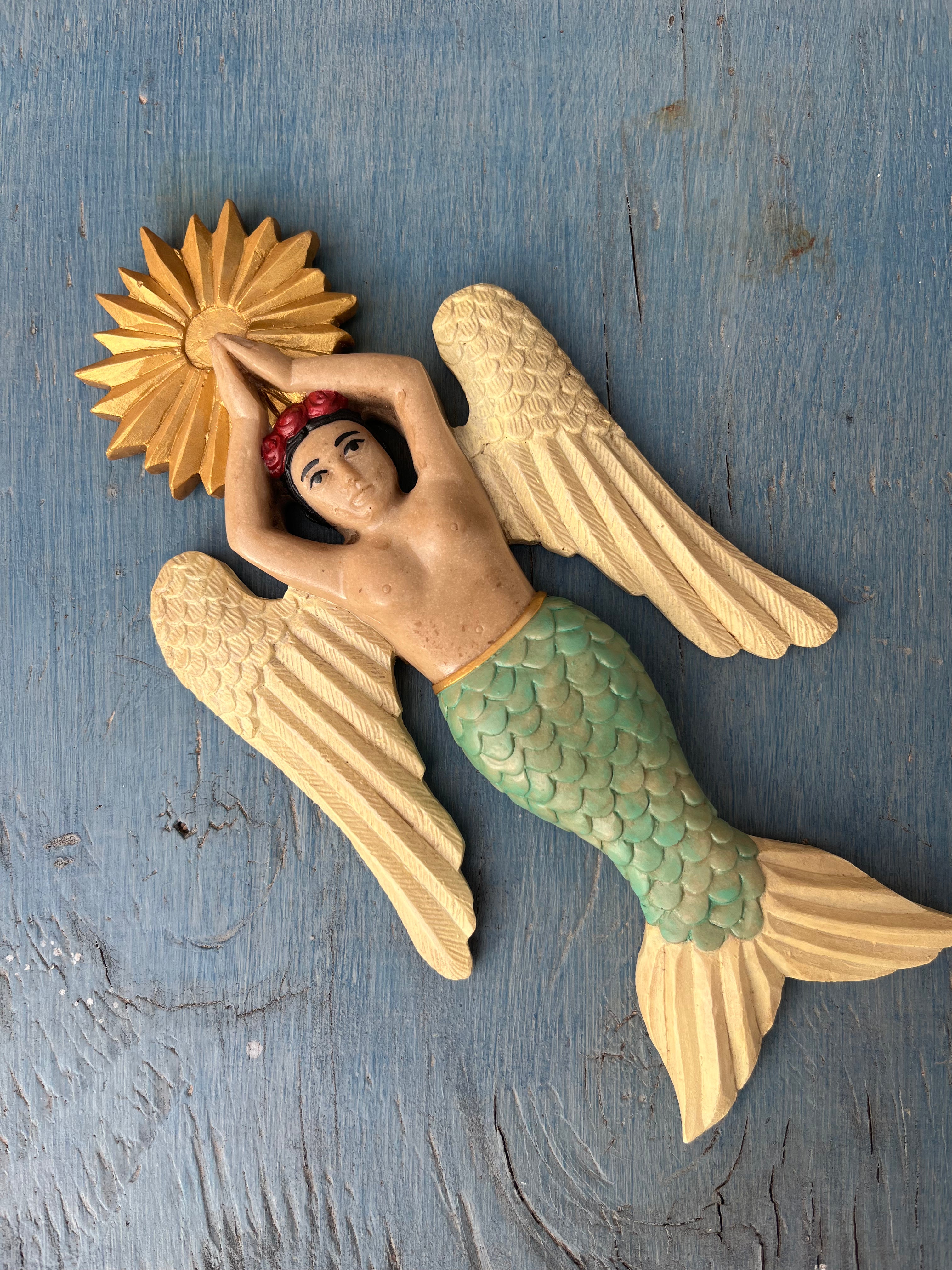 Sirena con alas
