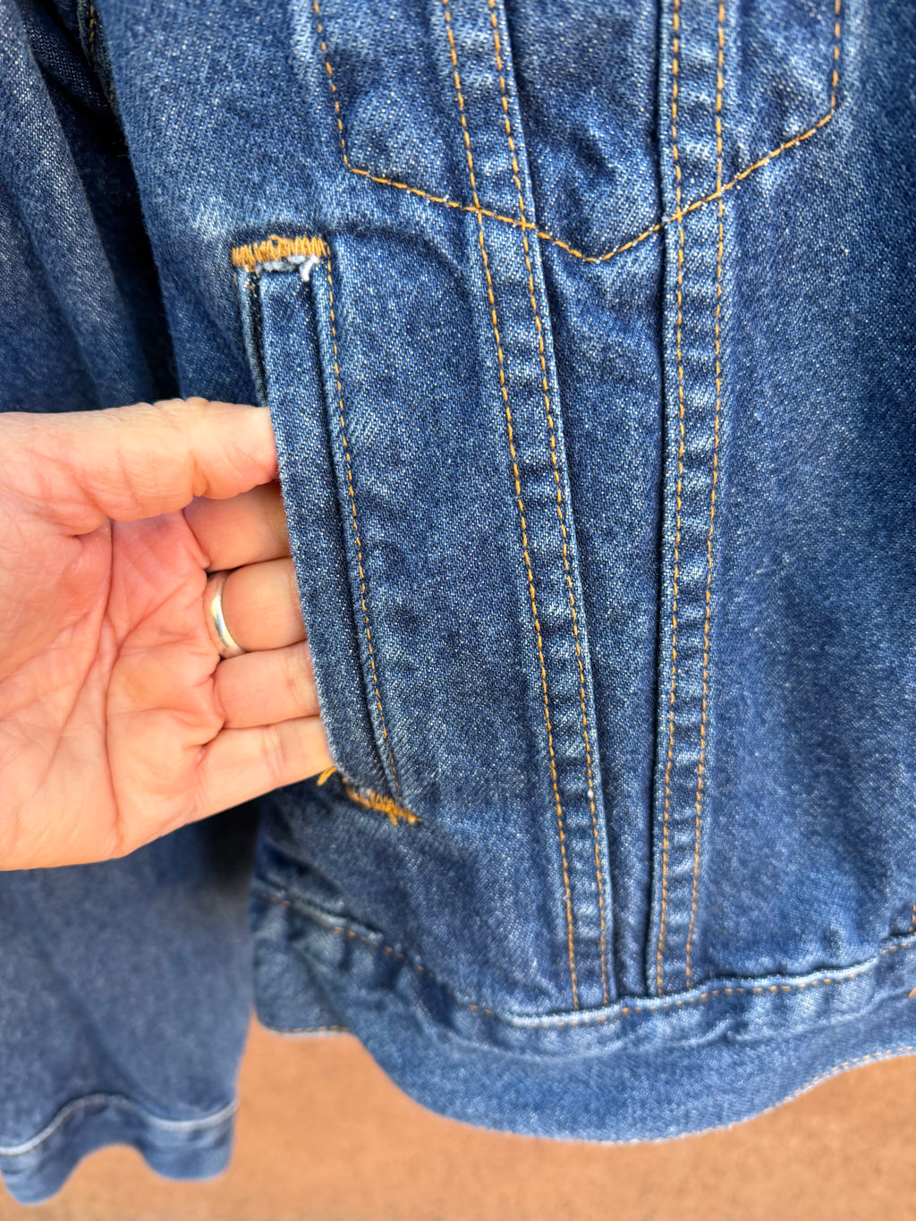 Second-Hand Levi's jacket with an original handwoven back panel- woven with 100% wool, undyed and commercially dyed yarns.