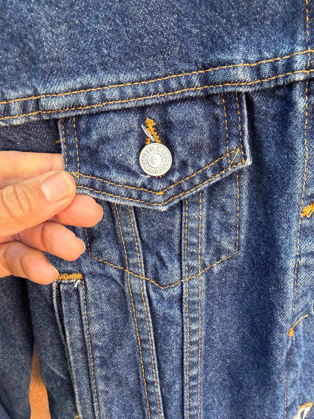 Second-Hand Levi's jacket with an original handwoven back panel- woven with 100% wool, undyed and commercially dyed yarns.