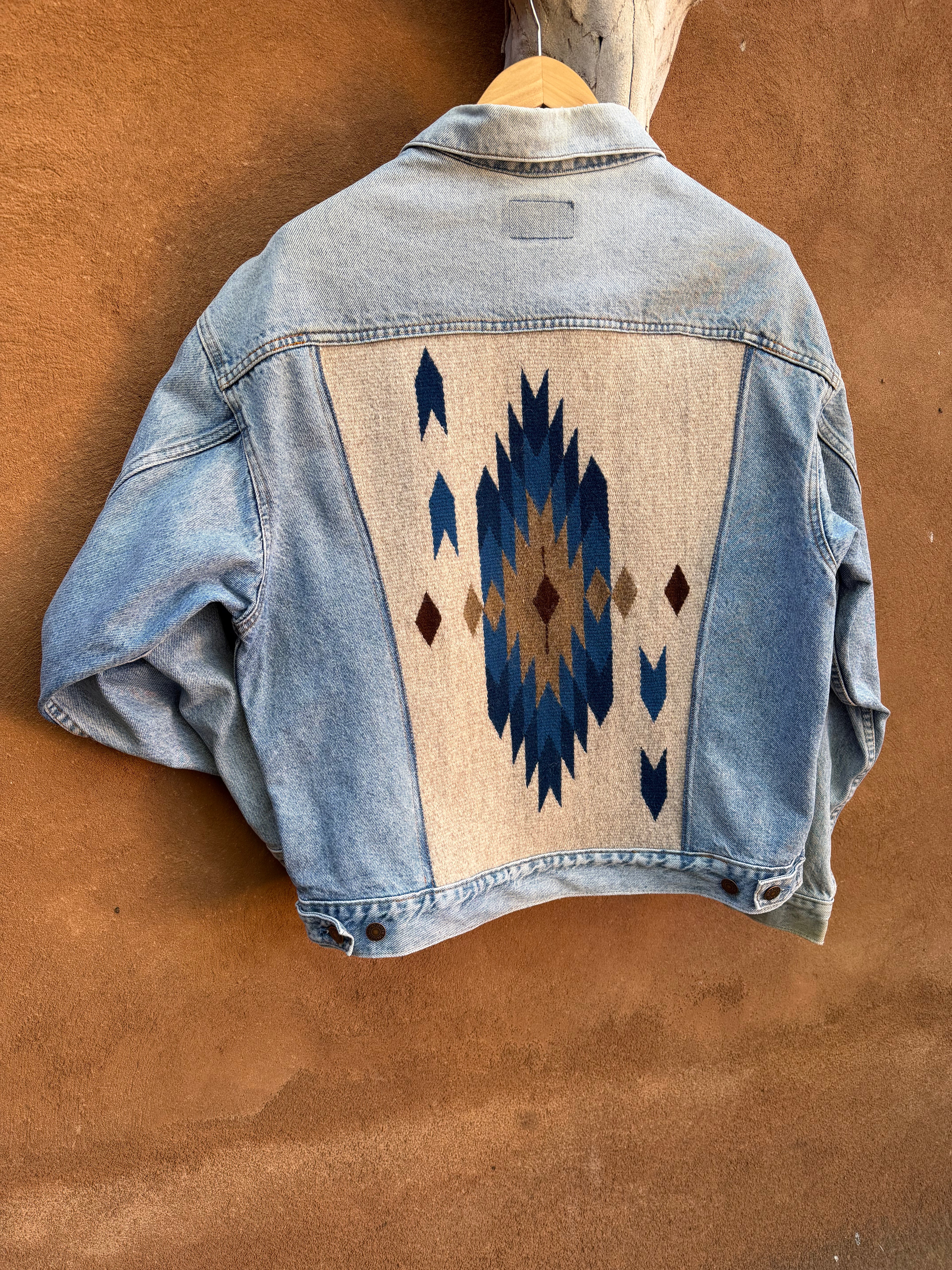 Second-Hand Levi's jacket with an original handwoven back panel- woven with 100% wool, undyed and commercially dyed yarns.