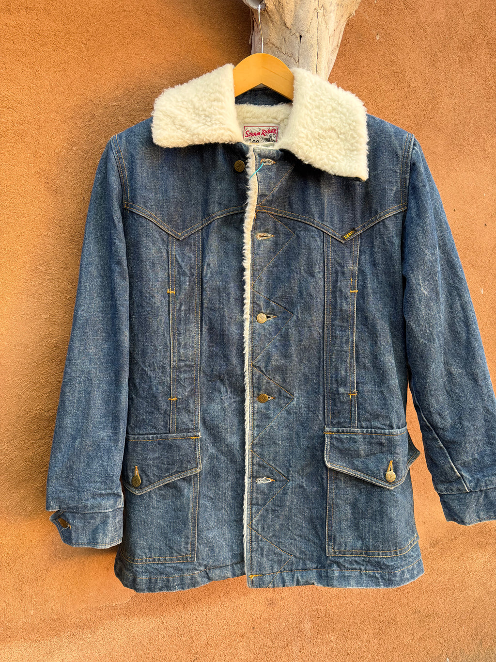 Second-Hand Lee fleece-lined denim jacket with an original handwoven back panel