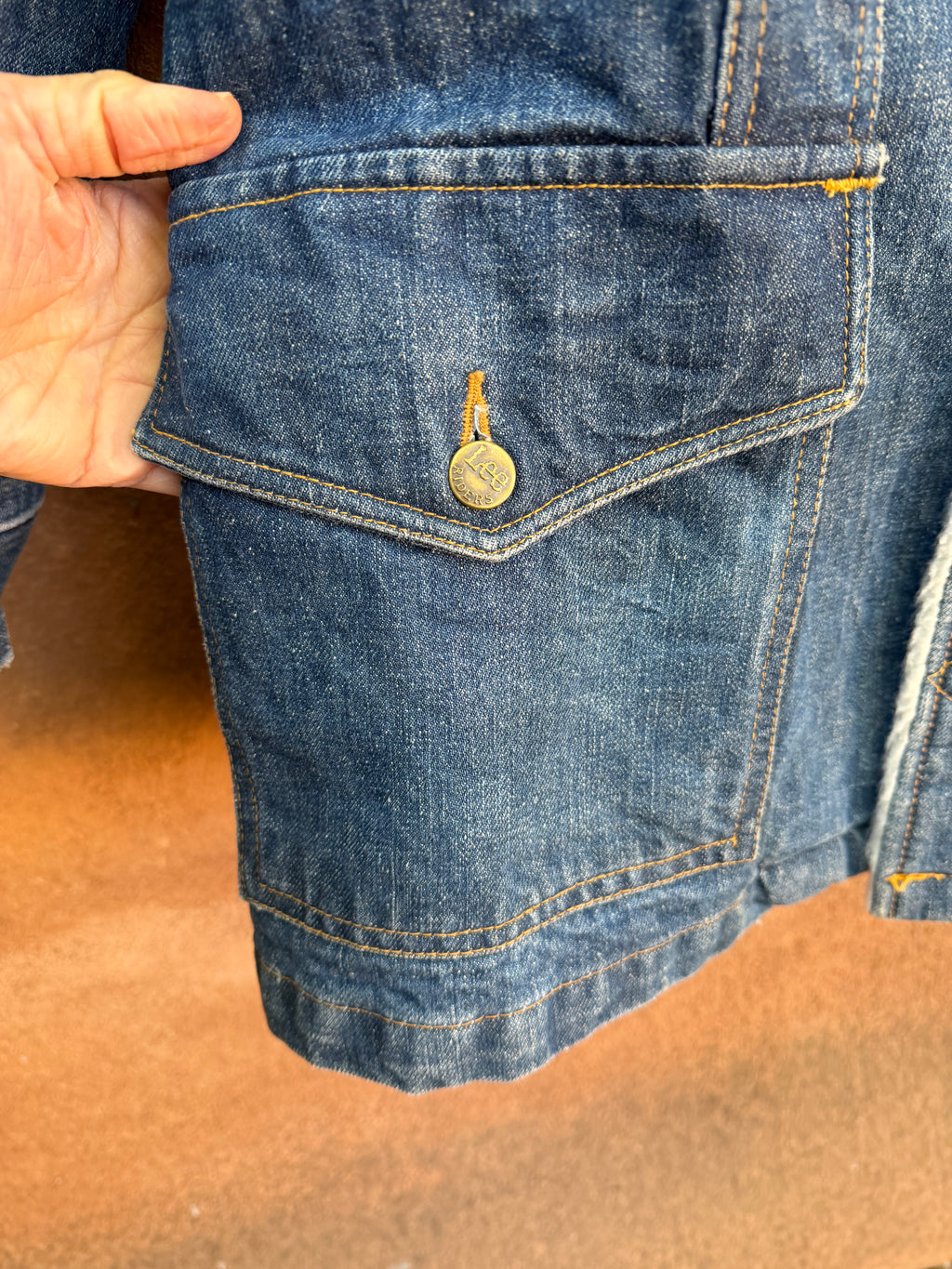 Second-Hand Lee fleece-lined denim jacket with an original handwoven back panel