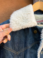 Second-Hand Lee fleece-lined denim jacket with an original handwoven back panel