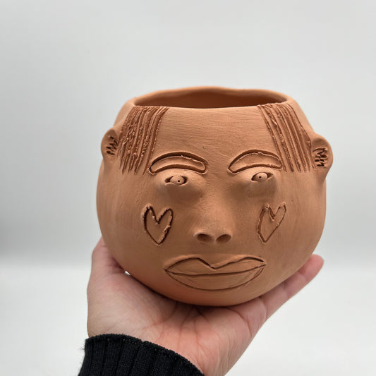 Terracota face planter