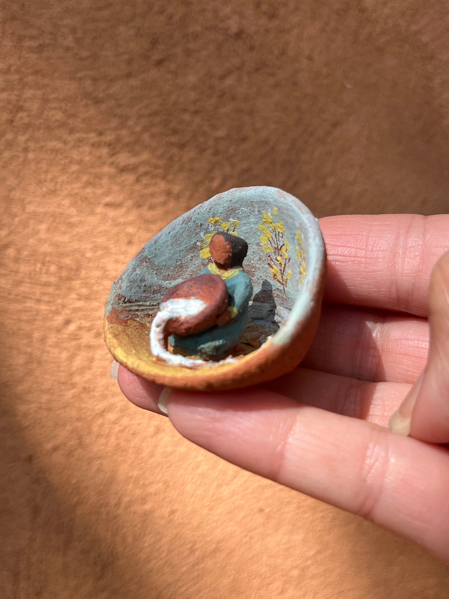 Tiny sculpture - woman with bowl