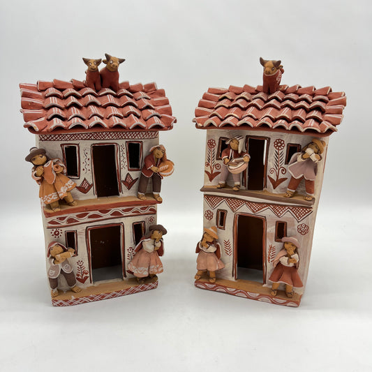 Musician houses - Bulls on roof