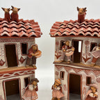 Musician houses - Bulls on roof