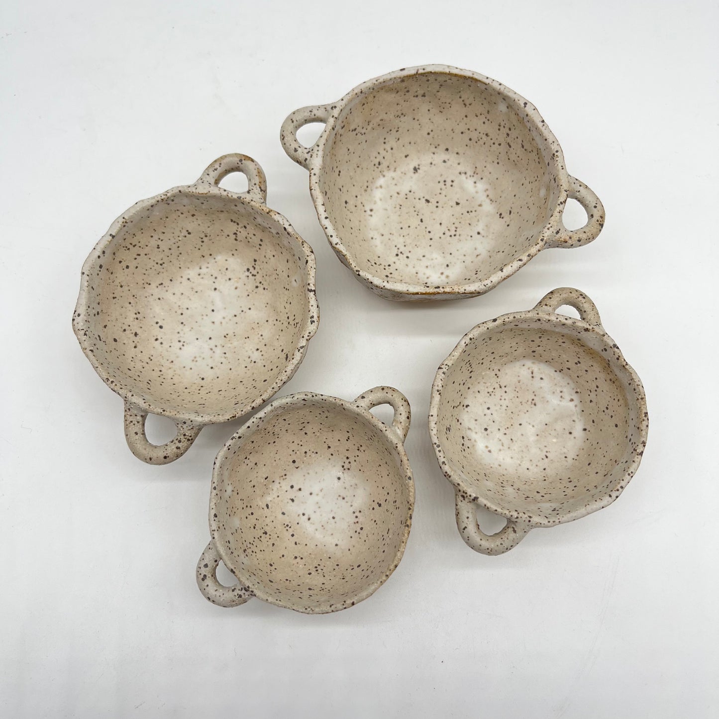 Assorted bowls with handles