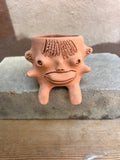 Medium Terracota face planter sitting - Maicito