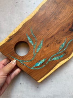 Cutting board with handle