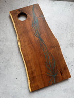 Cutting board with handle