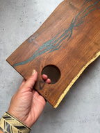 Cutting board with handle