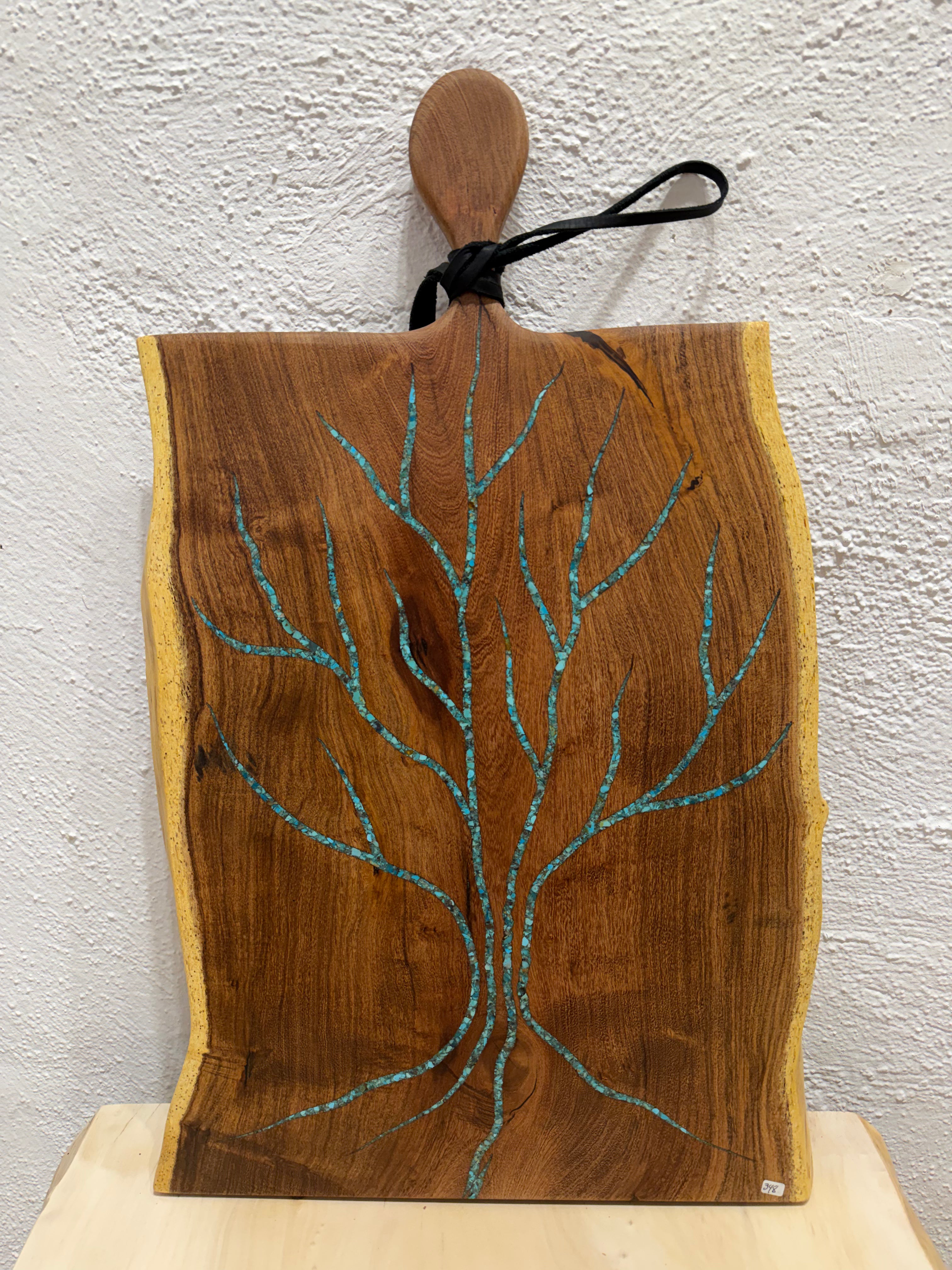 Cutting board with handle