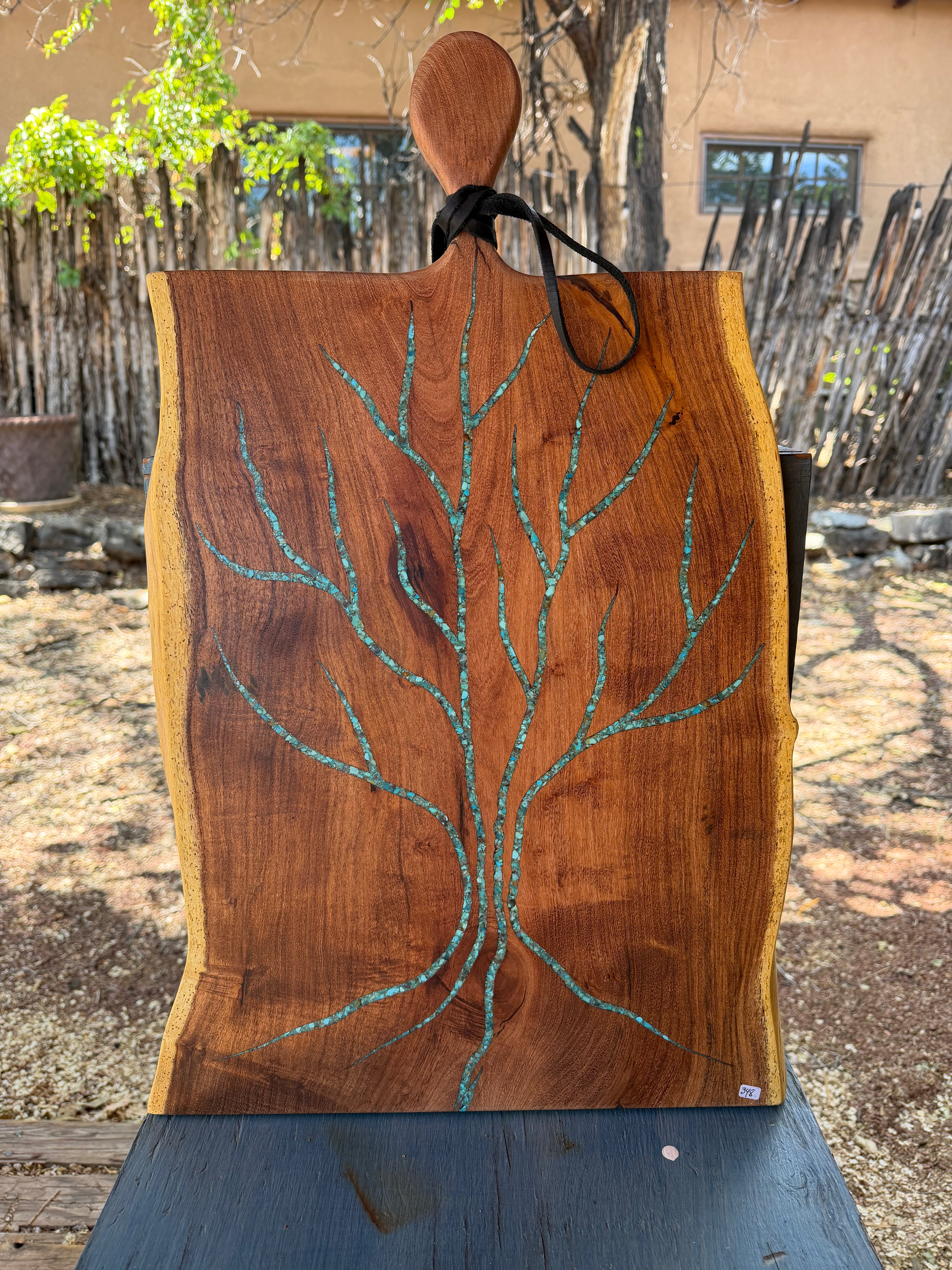 Cutting board with handle