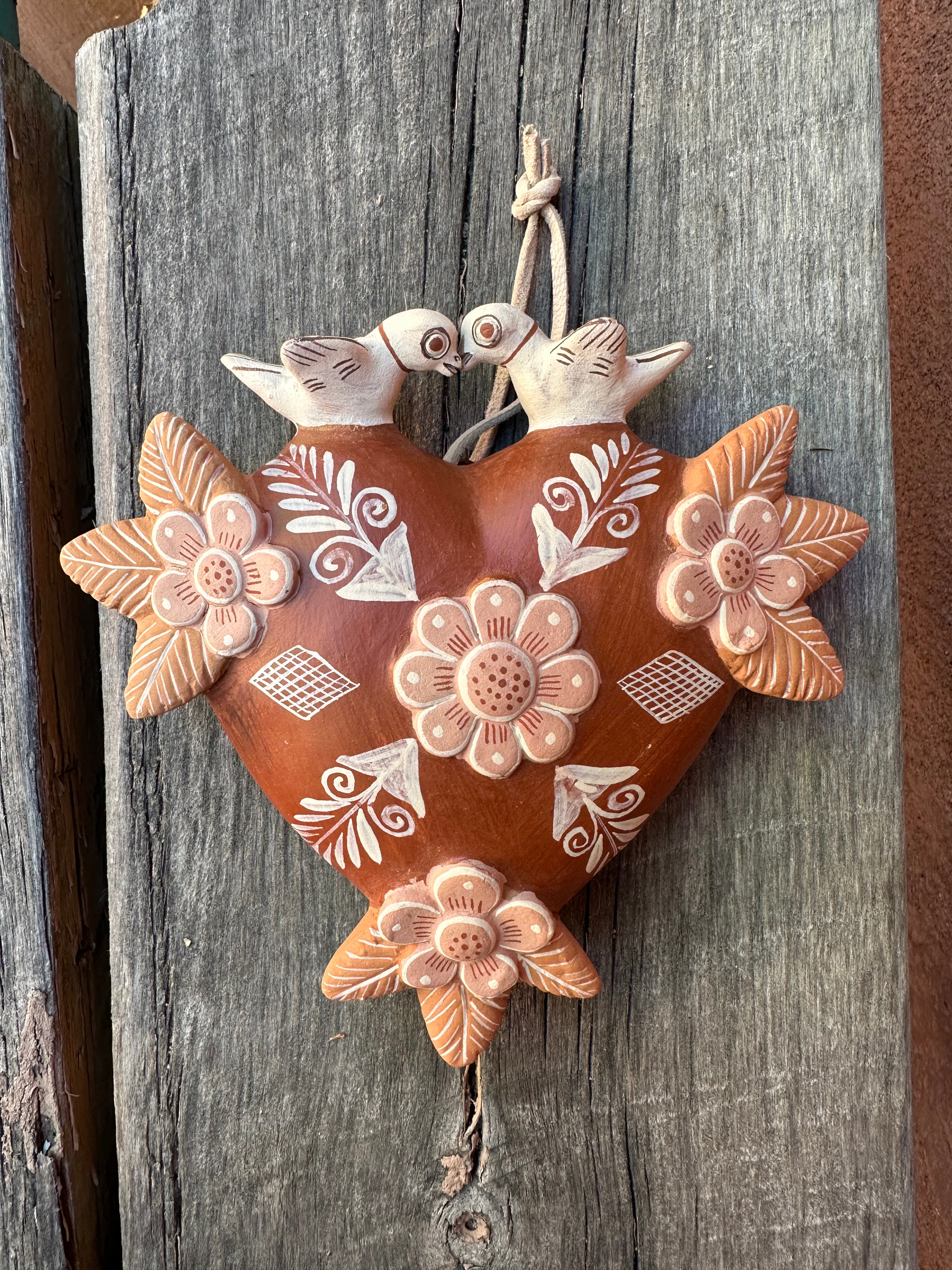 Heart with birds on top