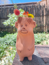 Load image into Gallery viewer, Terracota face planter with legs and arms
