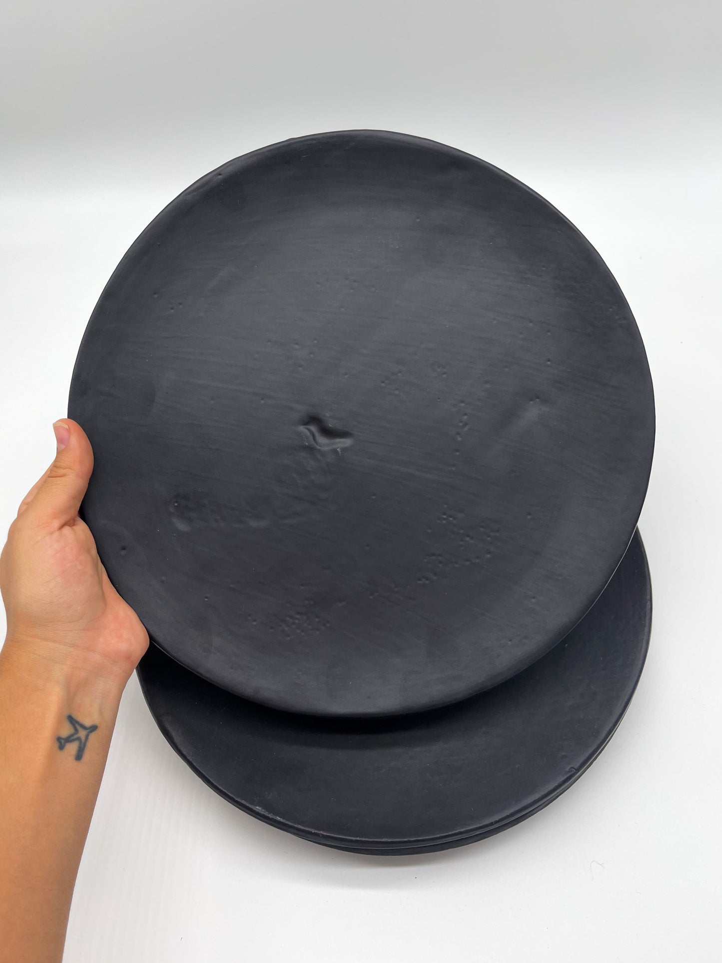 Round Dinner Plates - Black imprint on plate