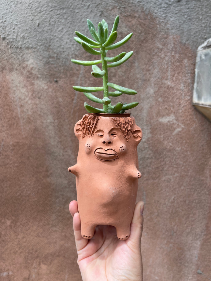 Short Arms ~  Terracota face planter with legs