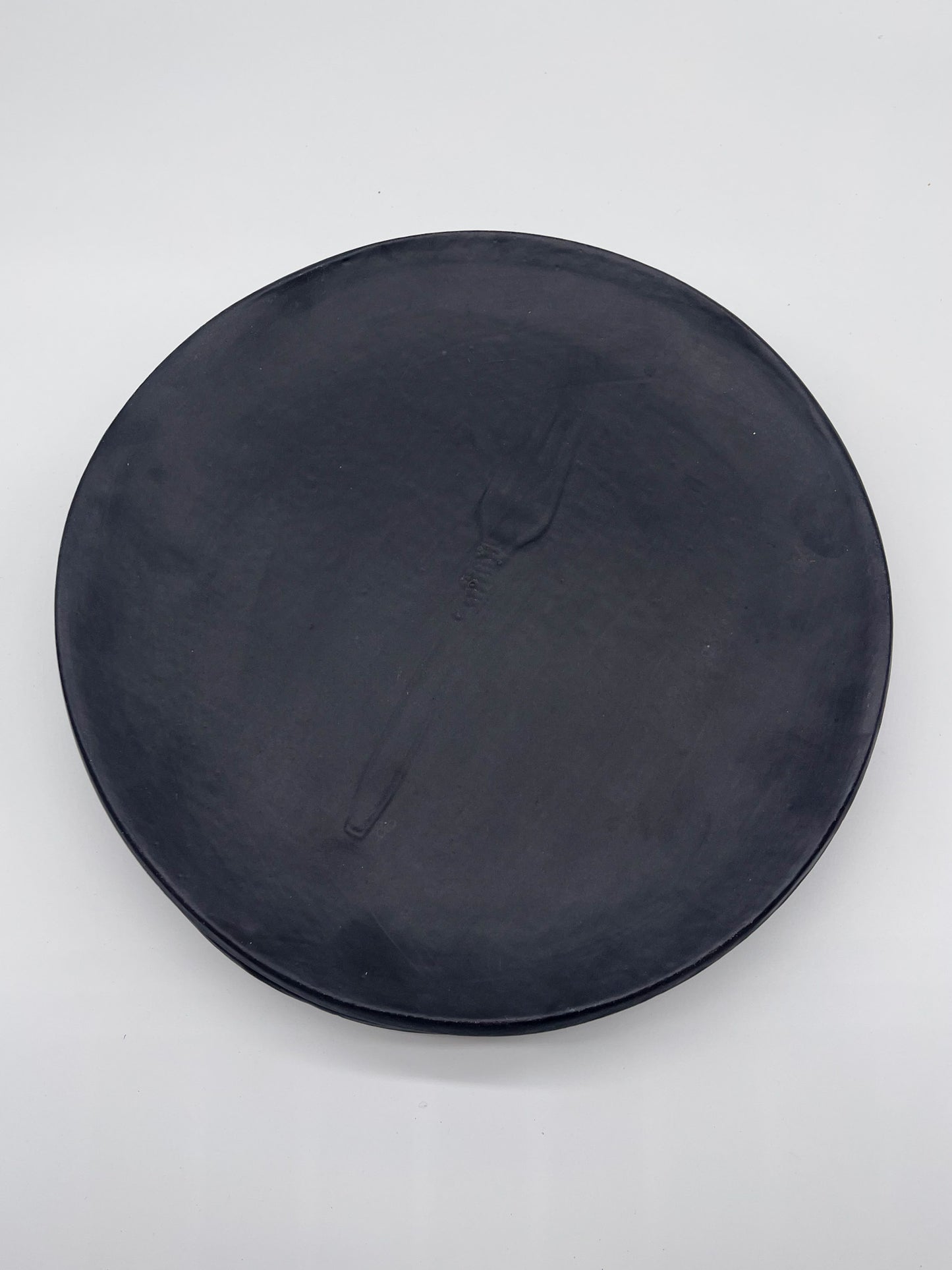 Round Dinner Plates - Black imprint on plate