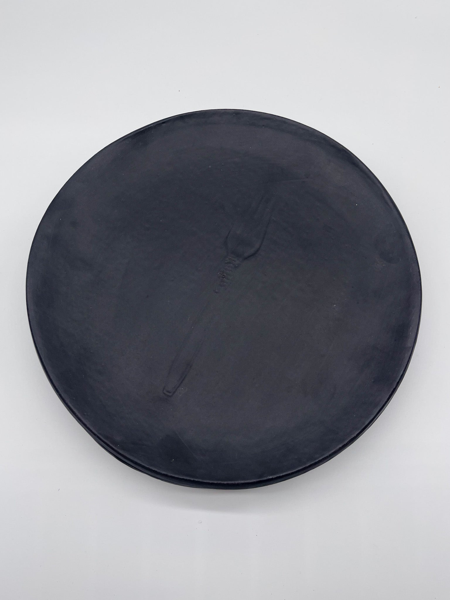Round Dinner Plates - Black imprint on plate